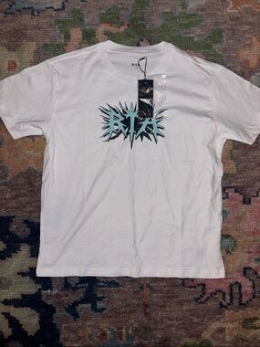 RtA White Tee with Teal and Black Spiky Logo